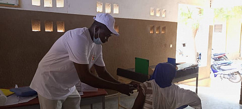 Nurse giving a vaccination.