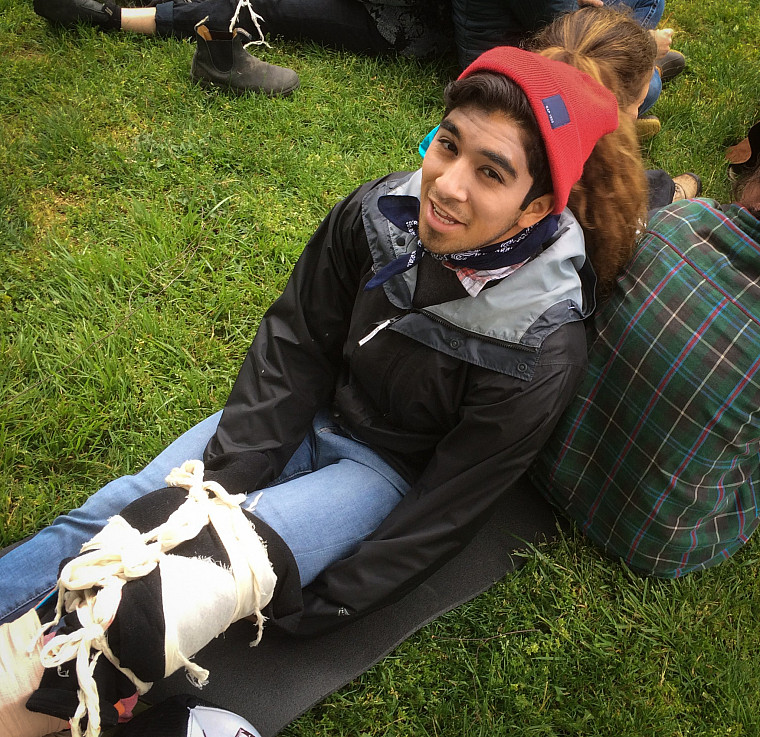 Wilderness First Responder patient demonstrates an improvised leg splint