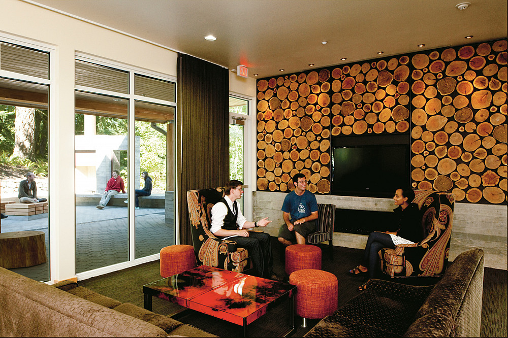 The original site's maple and fir trees were used to create wall paneling, furniture, stair treads, and other features.
