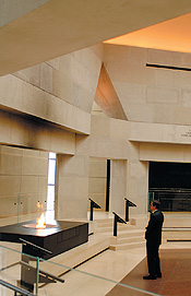 Levinger pauses for a moment of contemplation in the Hall of Remembrance at the Holocaust Museum.