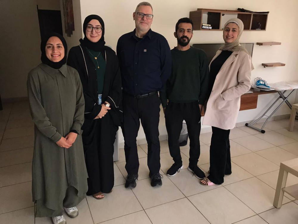 Professor Paul Powers with the Jordanian conversation partners