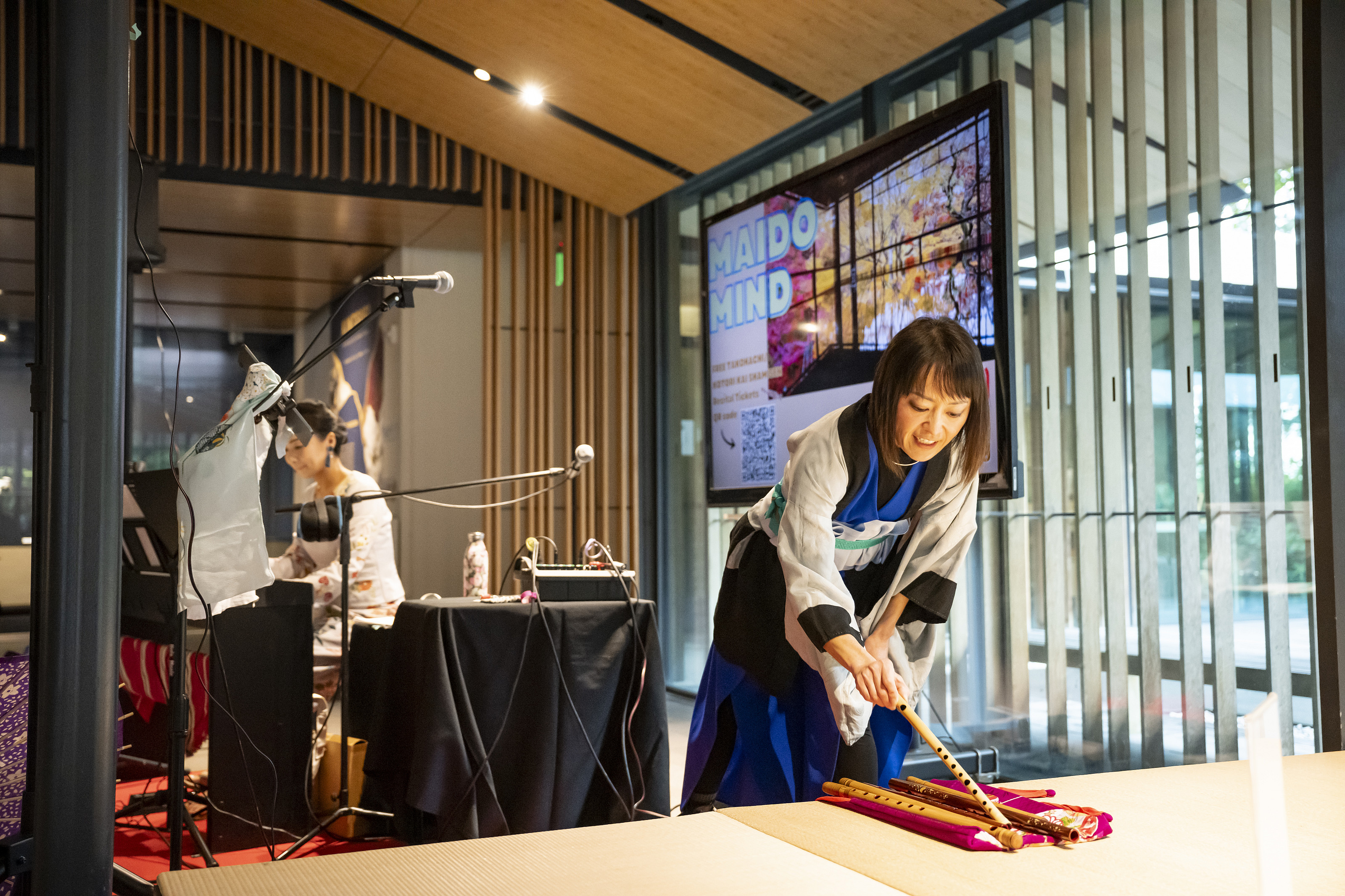 A performer using a Japanese musical instrument.