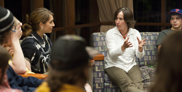 Greta Binford, 2011 Oregon Professor of the Year, talks with students