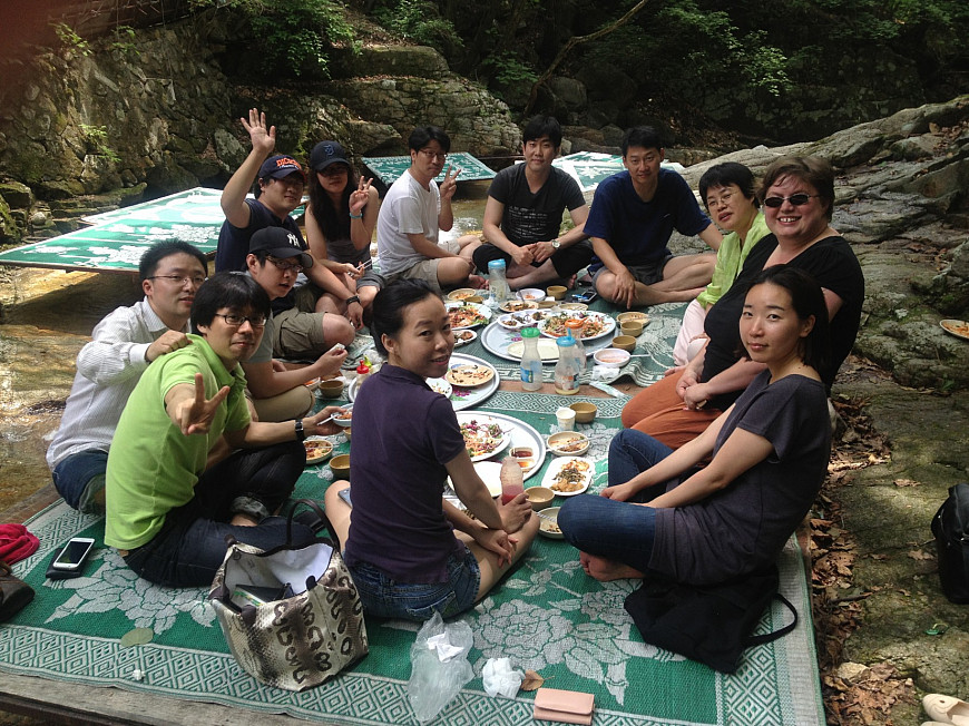 Aubrey Baldwin picnics with Korean law students at Soyang Lake